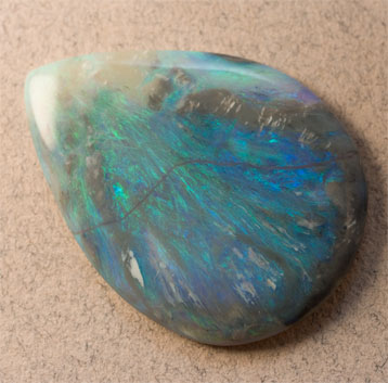 Large Semi-black Pear Opal 13.77 ct 31 x 23 mm pictorial turquoise