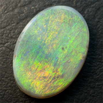 Large Semi-black Oval Opal 10.09 carats approx. 2.4 cm x 1.8 cm green and orange