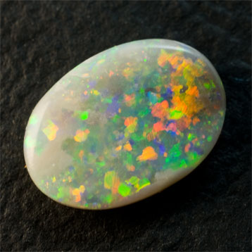 Sparkling Semi-black Opal 1.11 ct green and red checkerboard