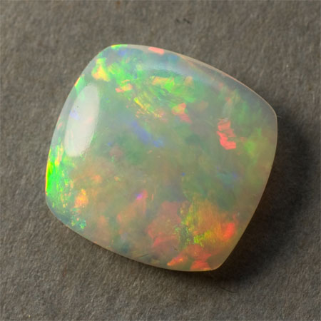 Cushion Crystal Opal 1.53 ct brilliant red, green, and yellow double-sided 1919